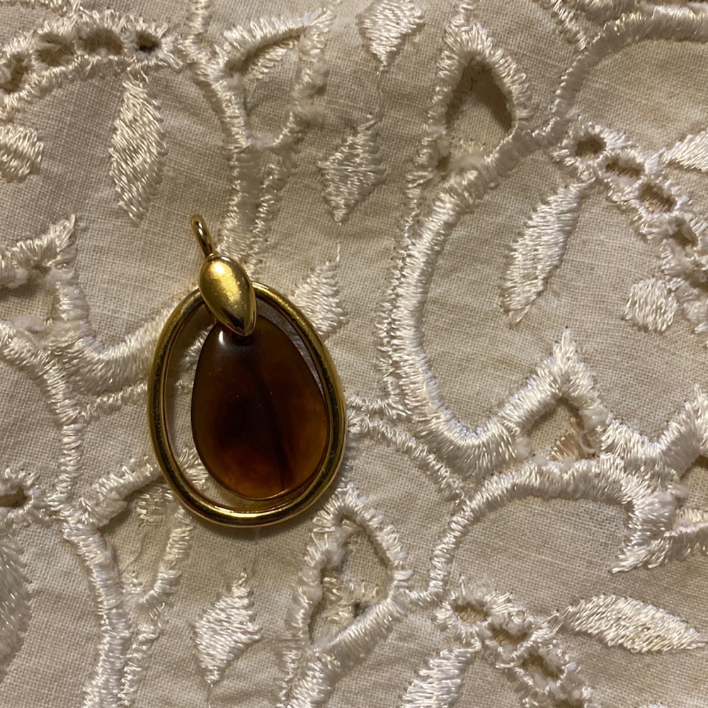 Gold/Faux Gold Plastic Amber Color Pendant